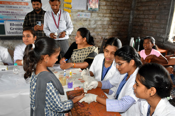 Students collecting the blood sample blood group test