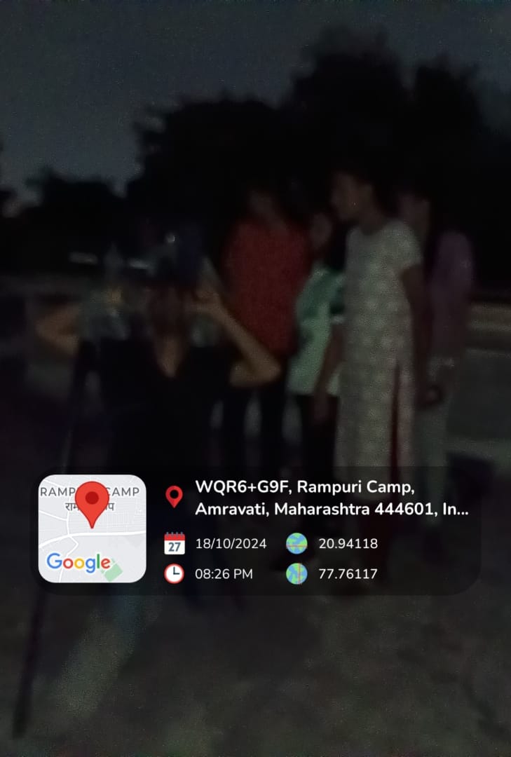 Students observing  sky through binoculars