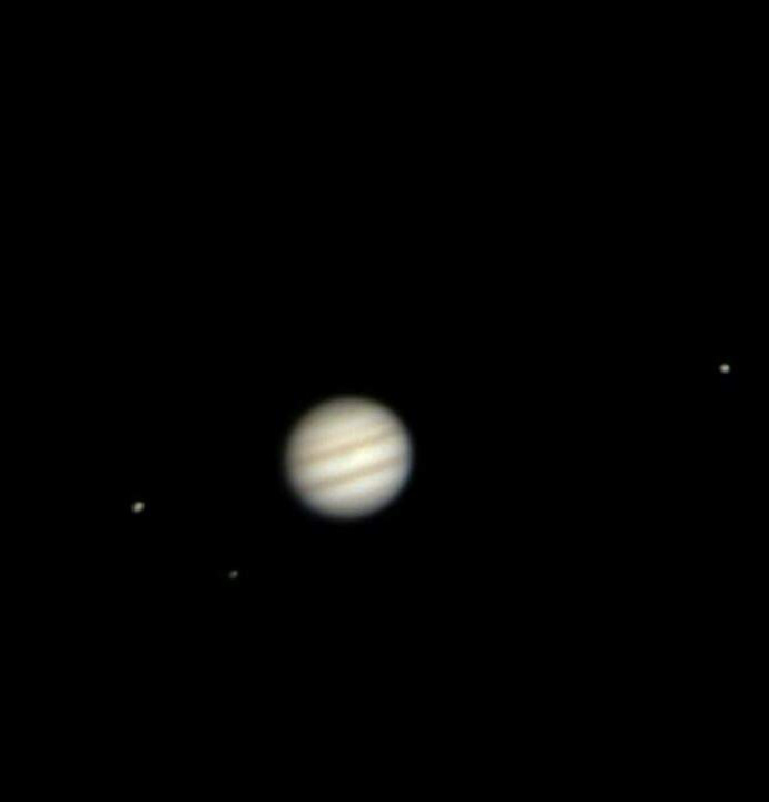 Jupiter and its Moons: Photograph captured through telescope using mobile camera