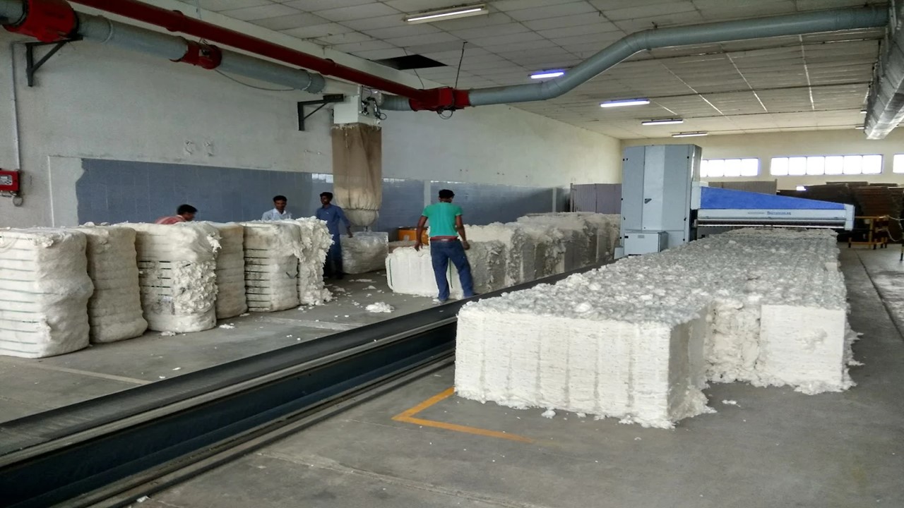Cotton storage and processing section observed during the visit to Sri Bhagirath Textiles.