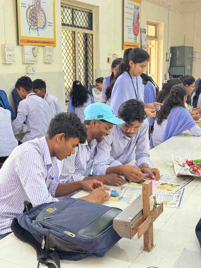Students making clay models