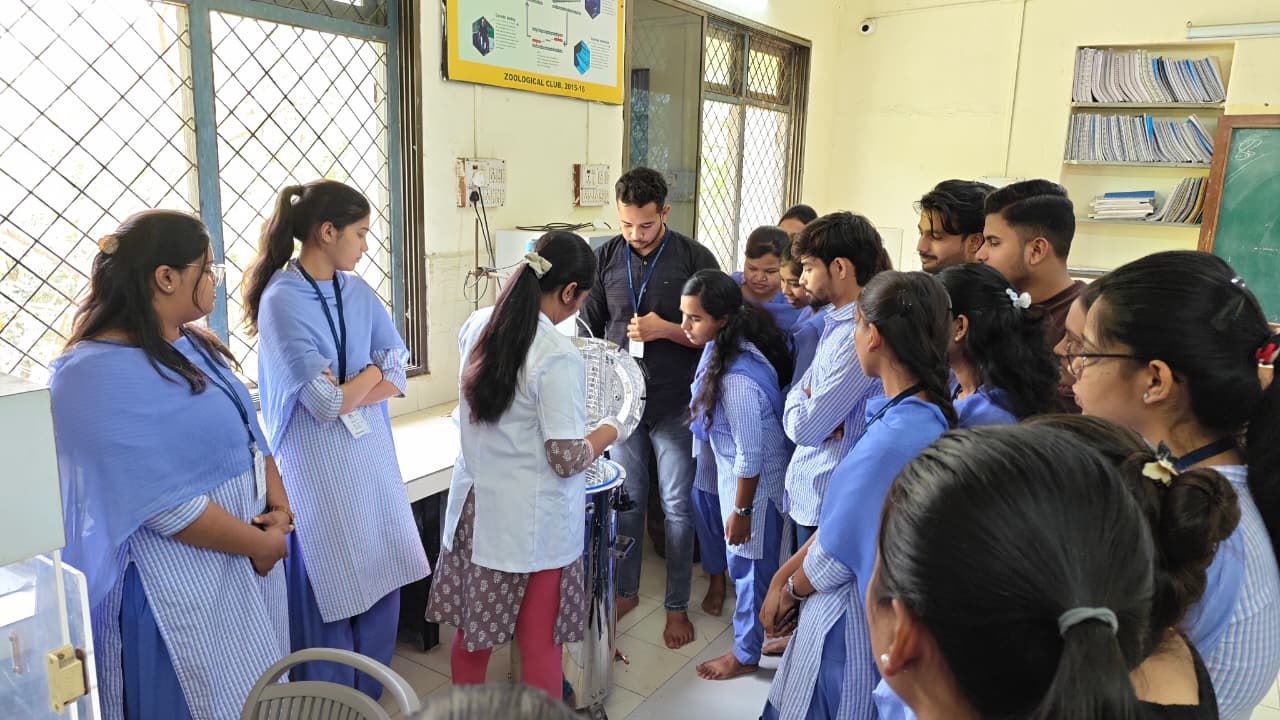 Students operating an Autoclave