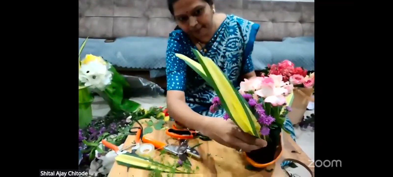 Dr Shital Dagwar showing arrangment of bouquet