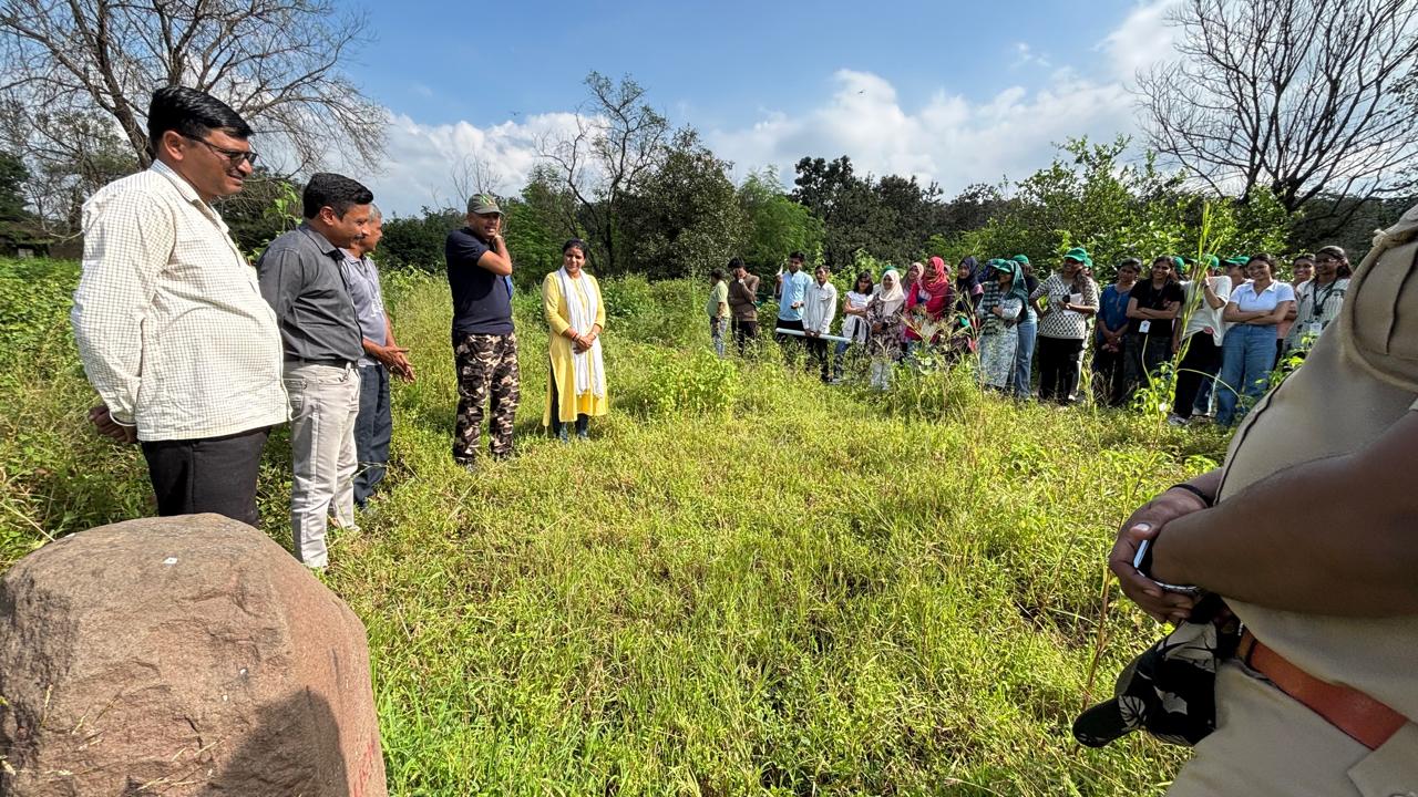 Interaction of the students with Mr. Talkhandkar and Field Guard regarding Relocated Pili village and its vegetation