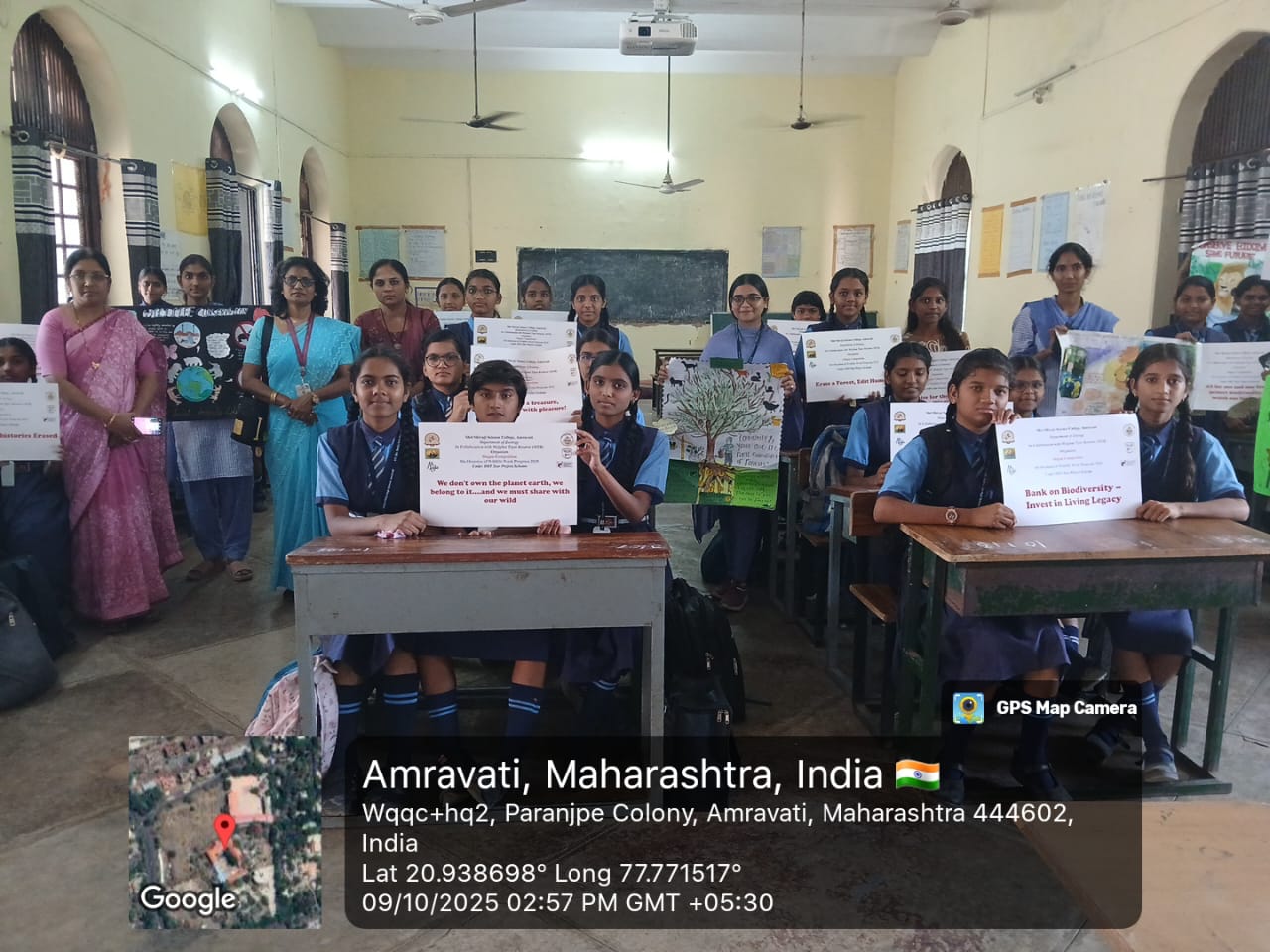 Students at Girls High School, Amravati with Poster-Slogans prepared by Dept of Zoology