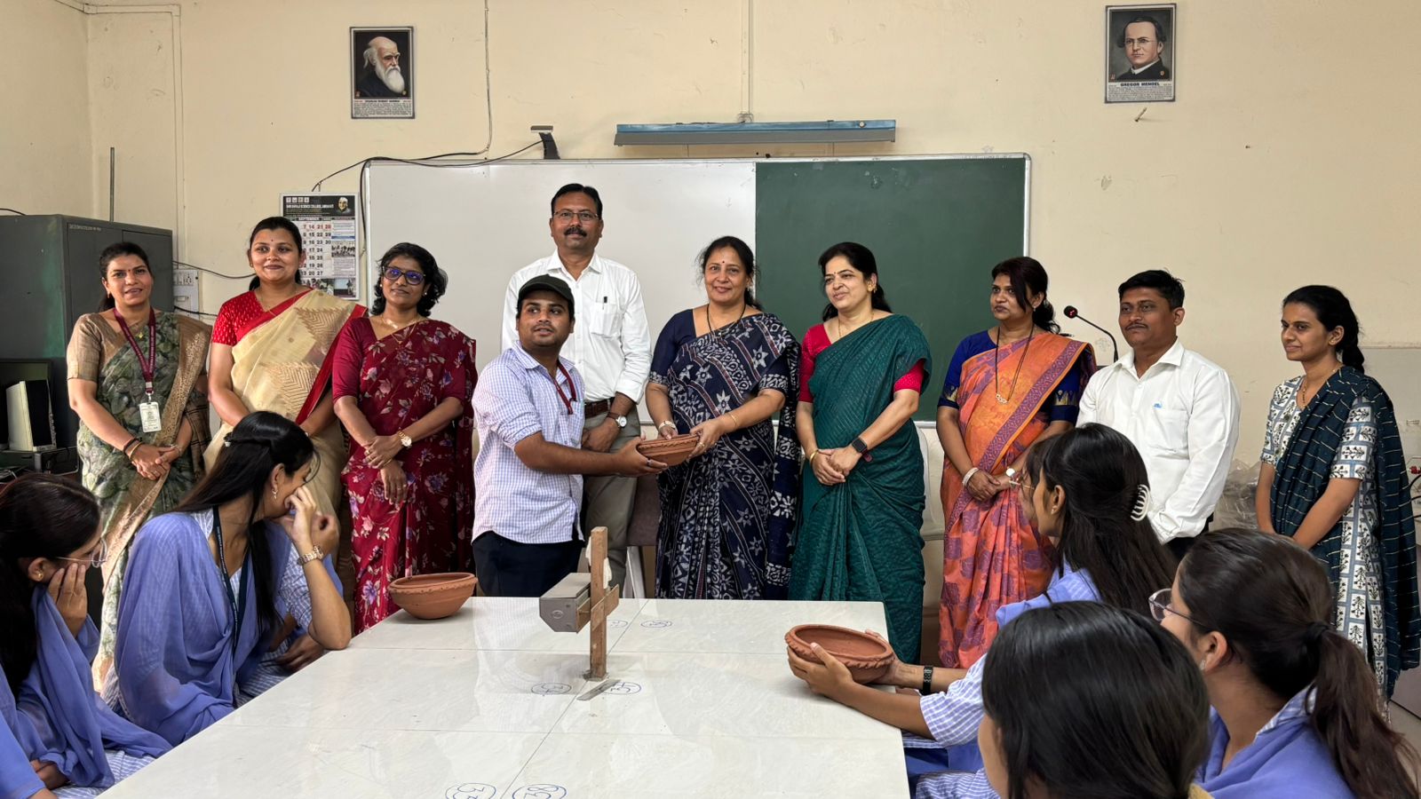 Water Bowl distribution to students by Faculty Members from Dept. of Zoology