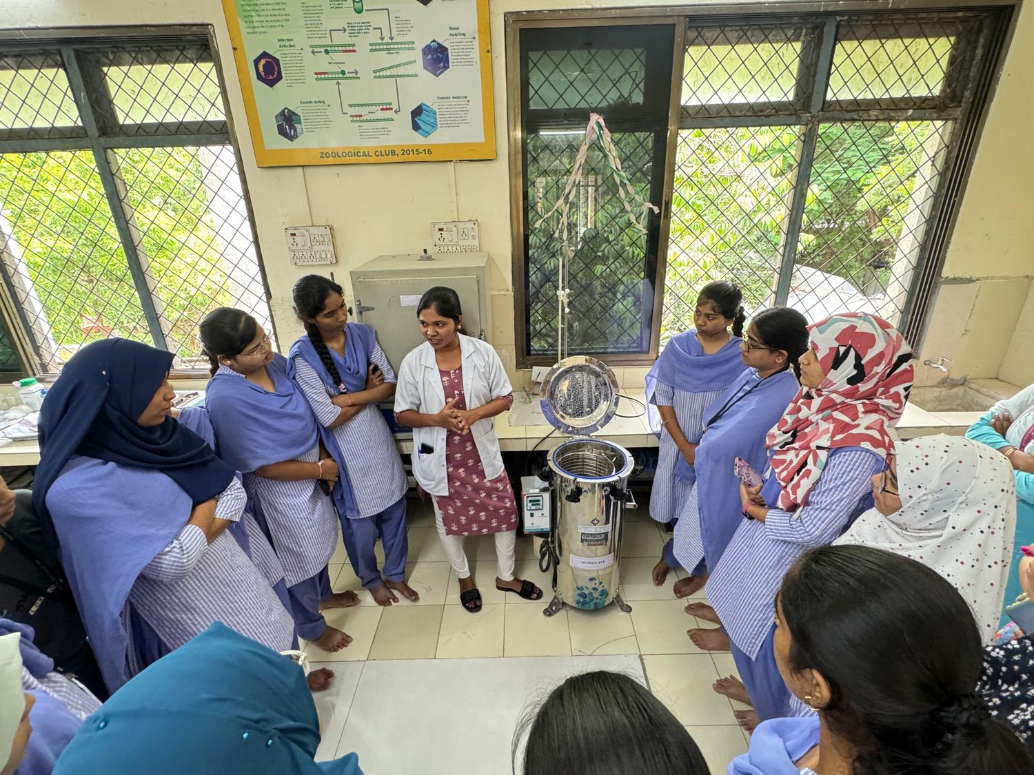 Ms. Vaishnavi Kuralkar explains autoclave techniques to participants